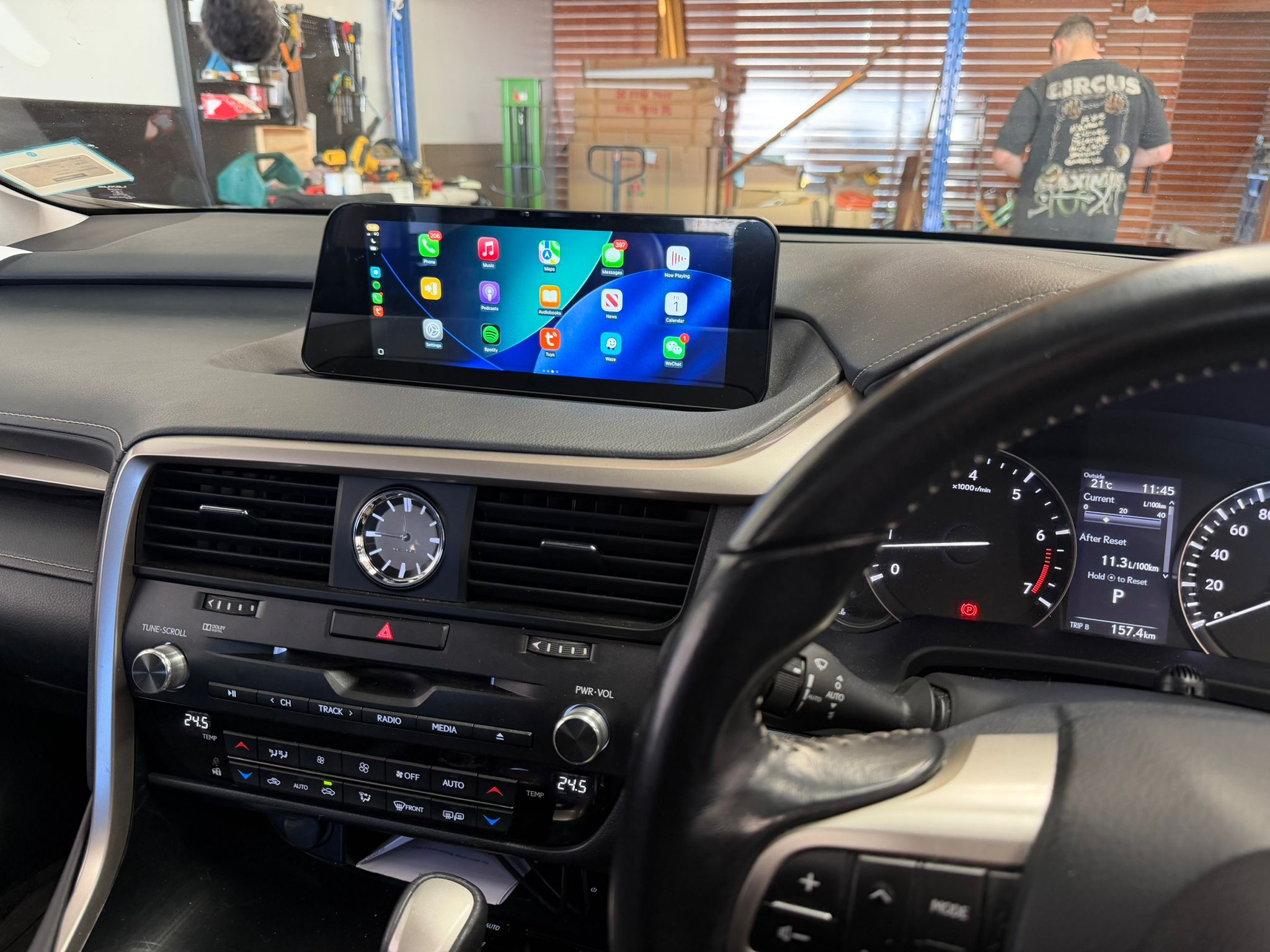 Kayhan Audio floating touchscreen head unit with Apple CarPlay interface installed in a Lexus RX